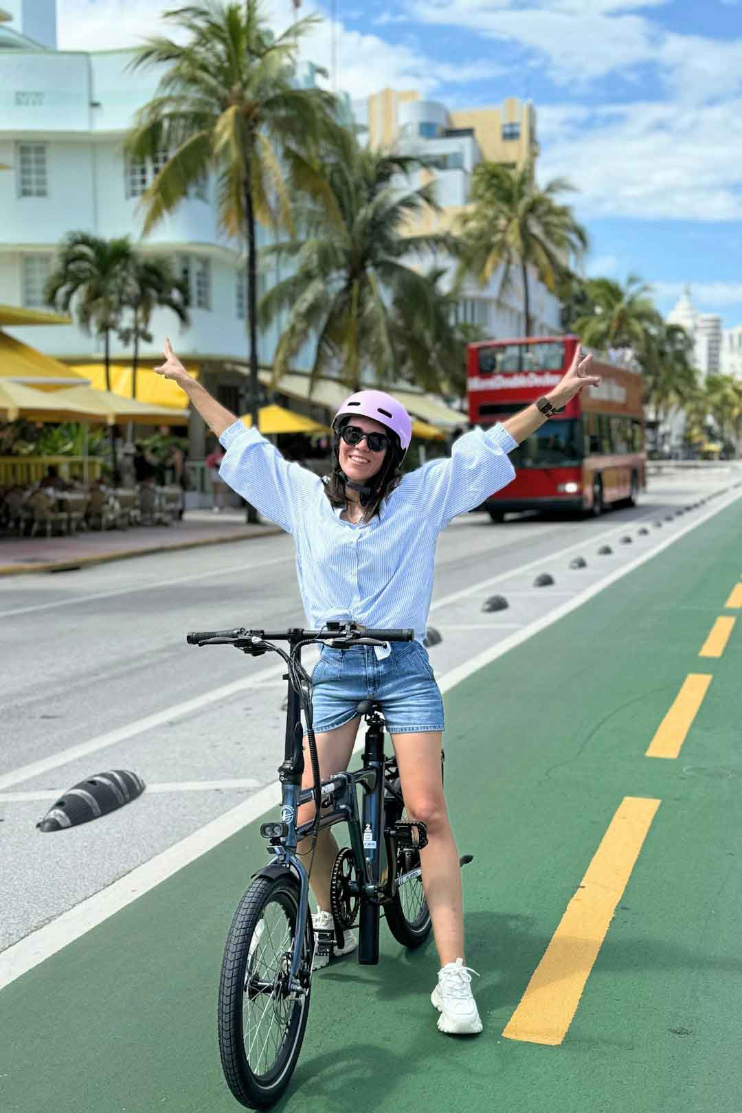 happy female cyclist enjoying a ride
