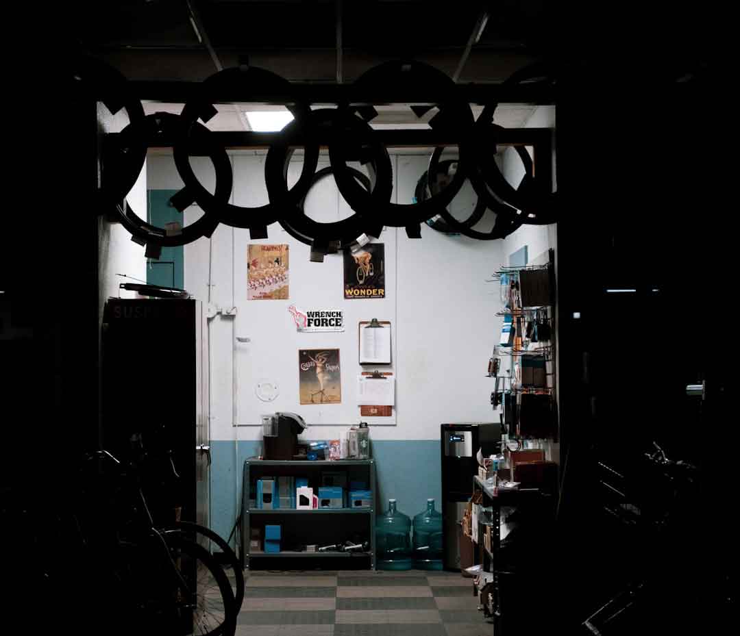 Cyclist choosing wheels in a shop