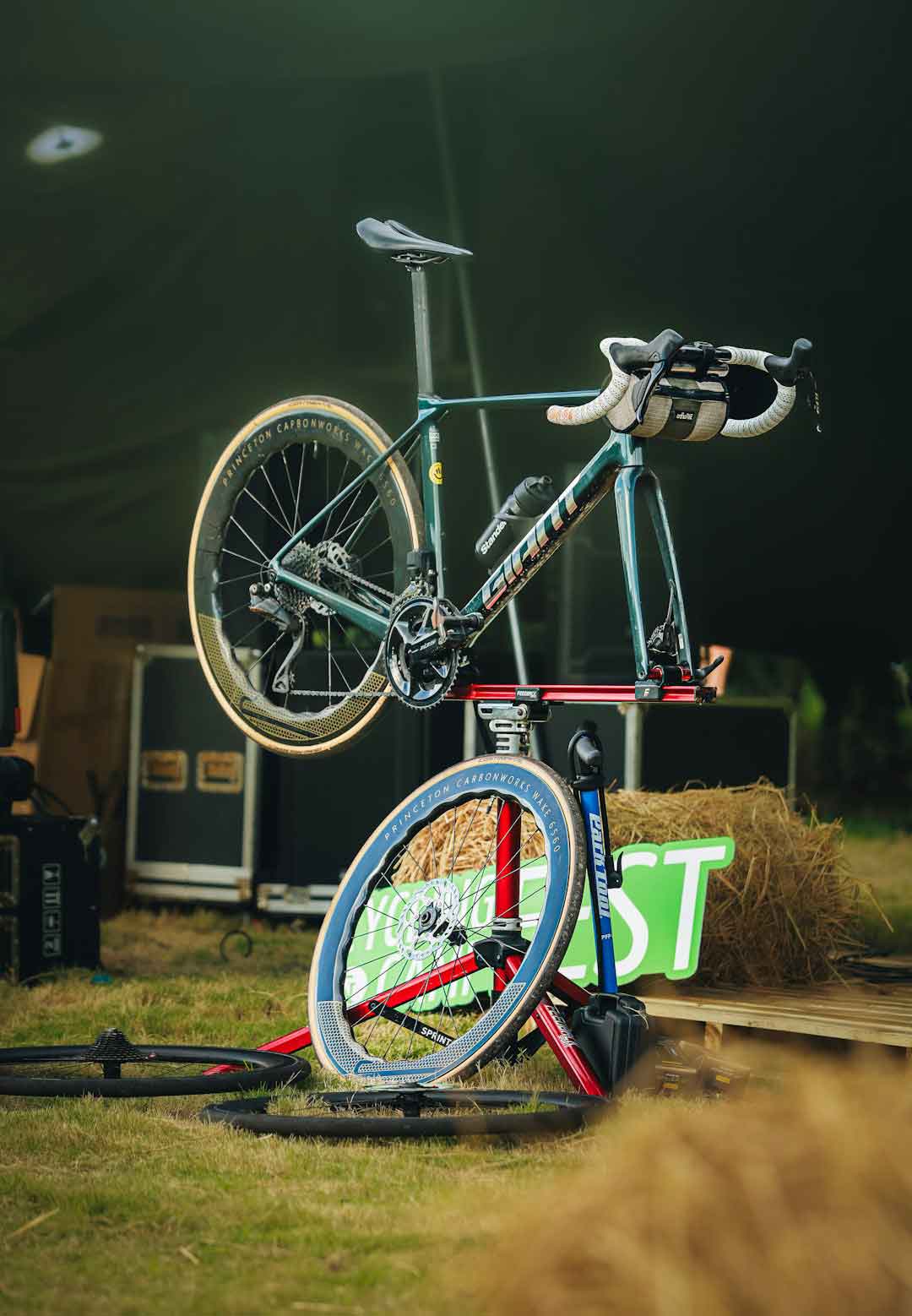 Cyclist performing bike maintenance