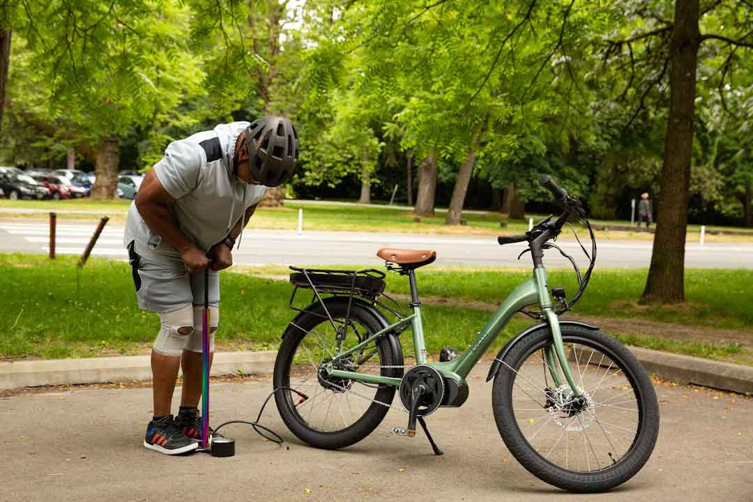 Cyclist maintaining a gravel bike