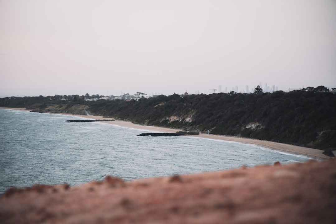 Cyclists riding along Australian coastline