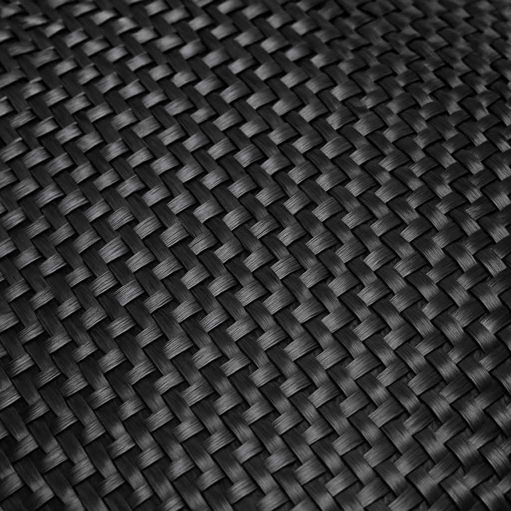 A close-up shot of a raw, woven sheet of carbon fiber fabric, looking like a high-tech black cloth