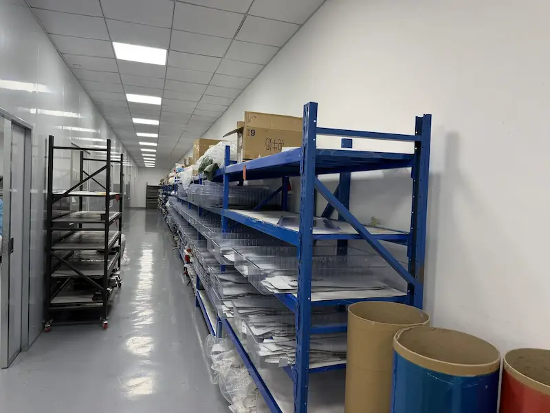Carbon fiber material storage corridor with rolls and boxes