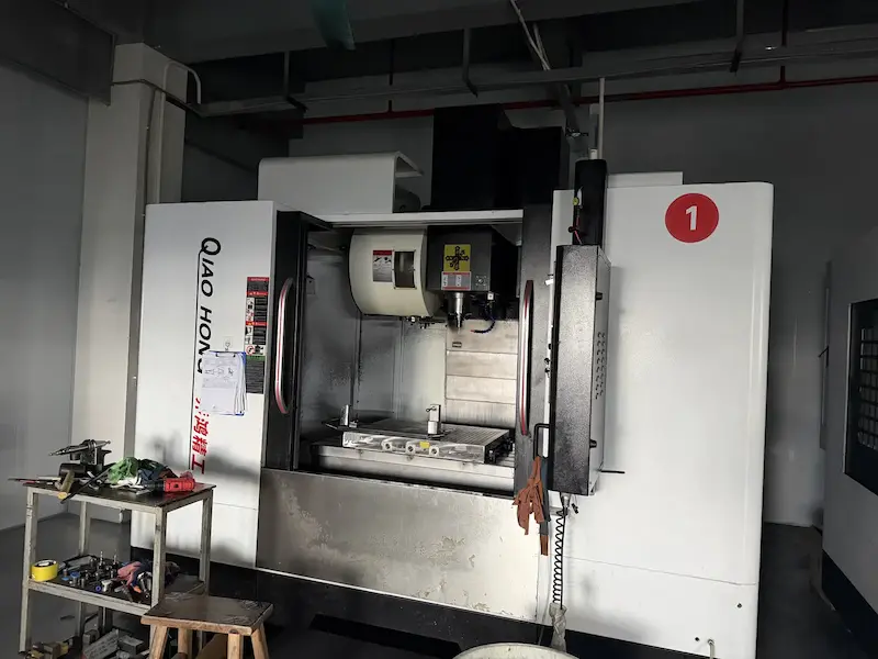 CNC machining center cutting carbon bike frame interfaces